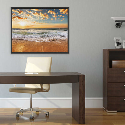 Modern office setup with a desk, chair, and framed beach scene on the wall.
